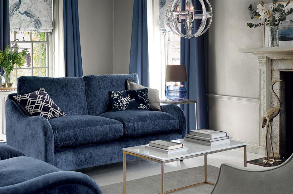 grey walls blue sofa living room