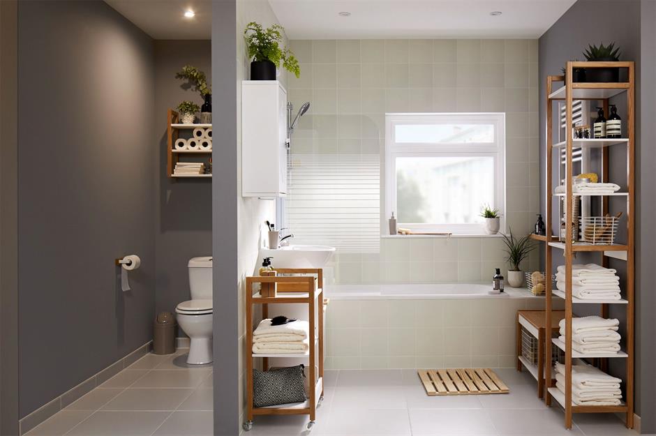 Shower Designs For Bathrooms : 7 Awesome Layouts That Will Make Your Small Bathroom More Usable : This contemporary vanity design is a nice juxtaposition to the heavily patterned wallcovering in this small but mighty bathroom.