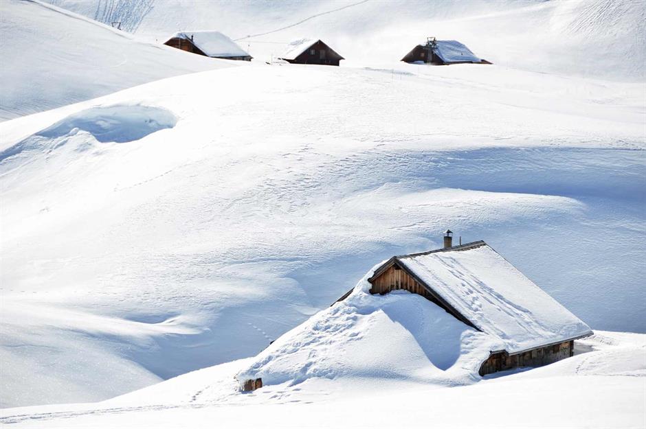 Snow-logged farmhouses, Melchsee-Frutt, Switzerland
