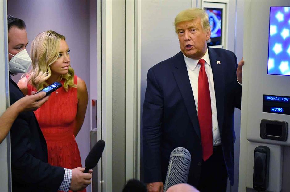 Did Trump share classified material with aides and journalists?