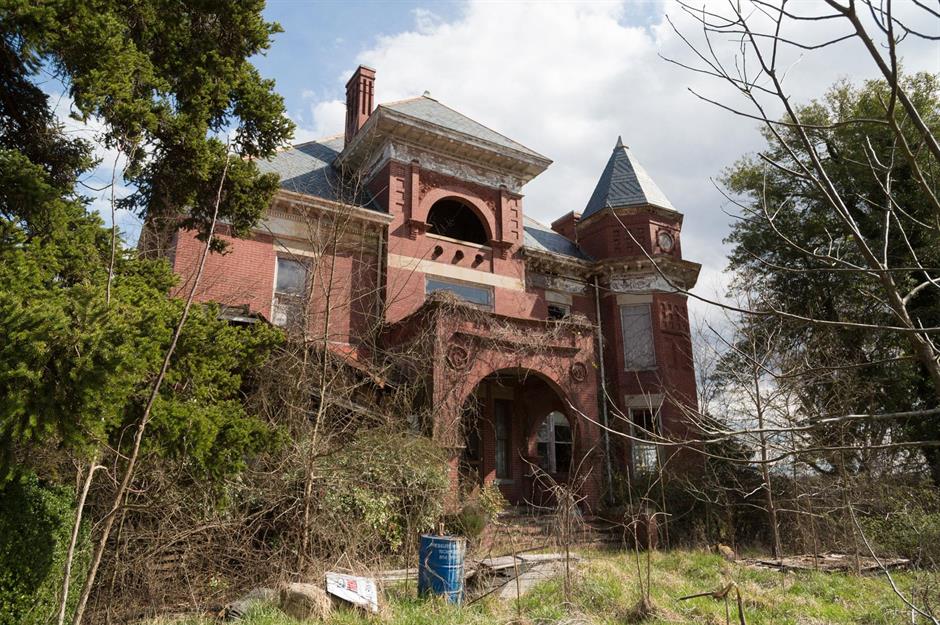 Tour the curious crumbling manor hidden within a country club