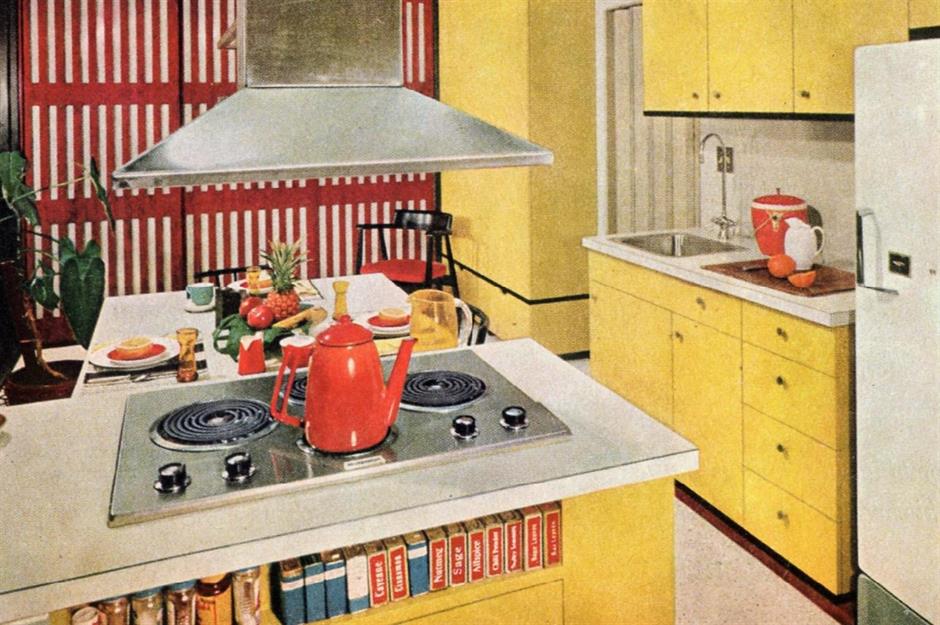 Kitchen with white stone countertops, solid wood cabinets, and vintage tile  on the walls Stock Photo - Alamy