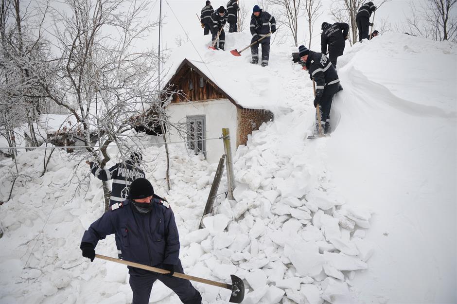Firemen clear the snow, Bucharest, Romania