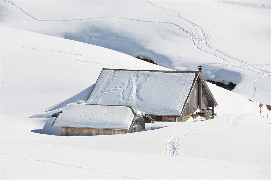 Snow-logged farmhouses, Melchsee-Frutt, Switzerland