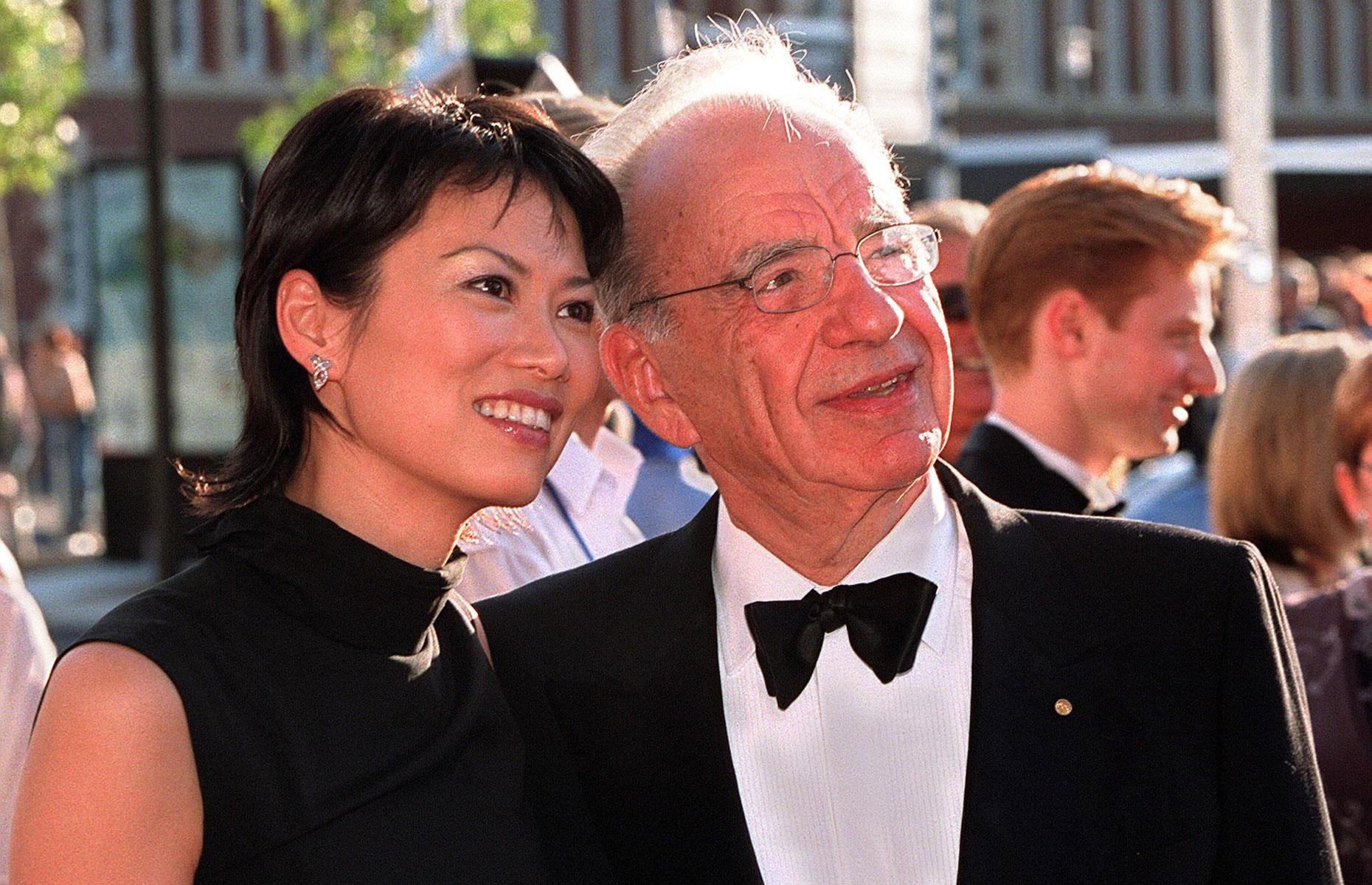 Rupert Murdoch divorces his second wife, sets up the irrevocable trust and marries Wendi Deng