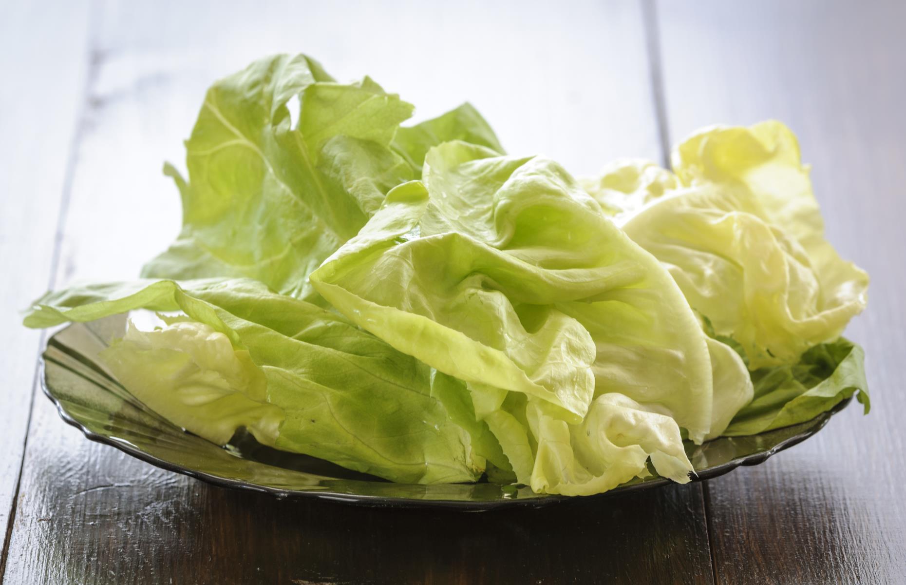 28. Serve fried eggs on lettuce