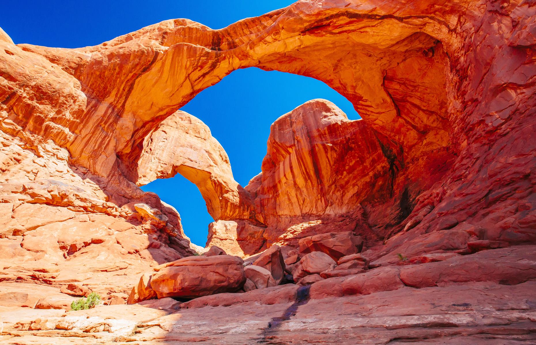 Visit Natural Bridges National Monument over Arches National Park in Utah