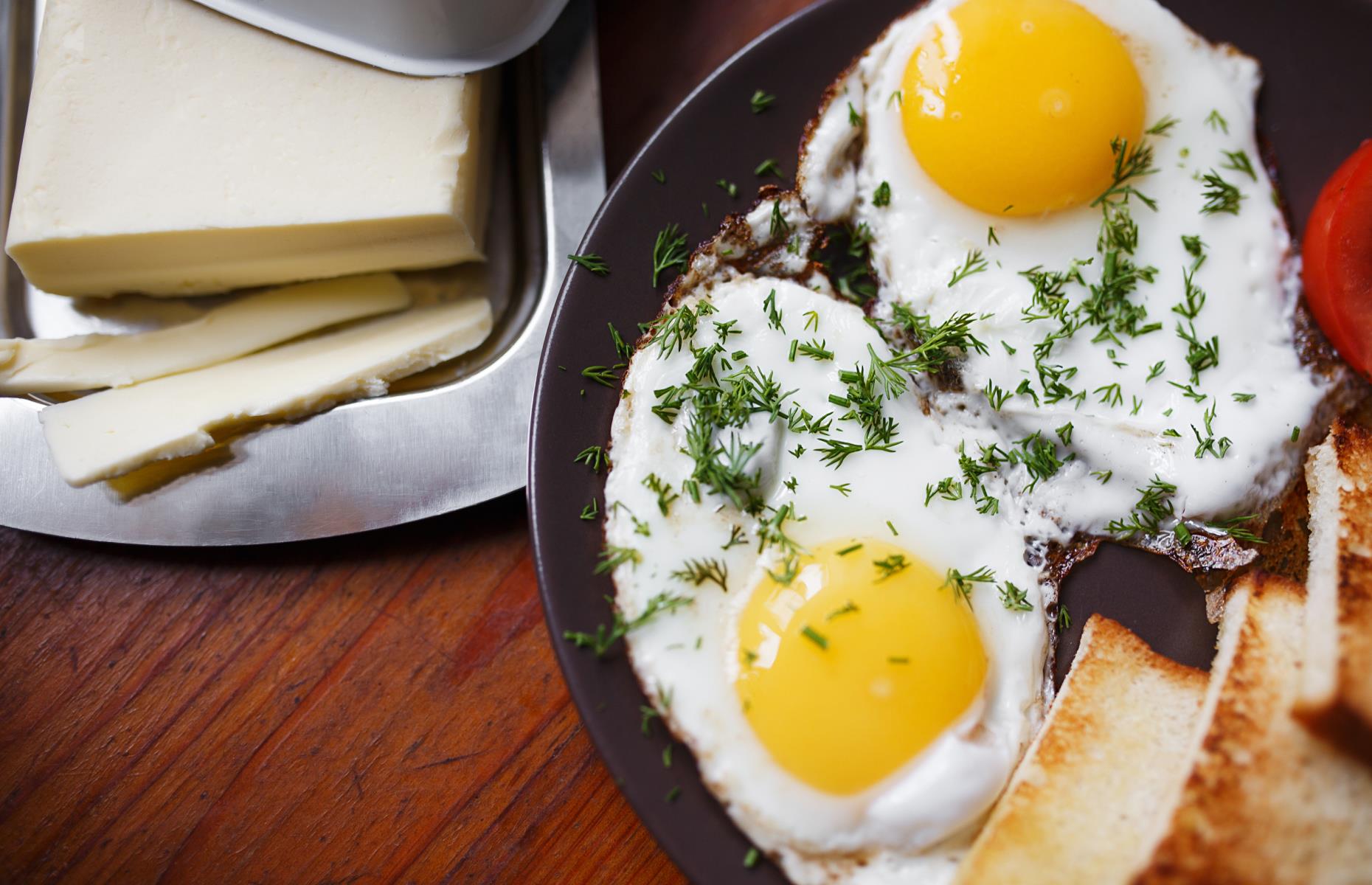 Good fried eggs are actually poached in butter
