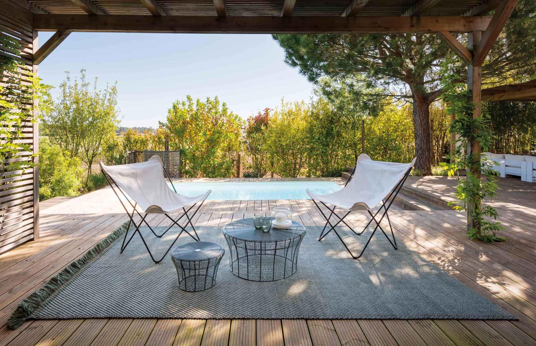 Lay down outdoor rugs