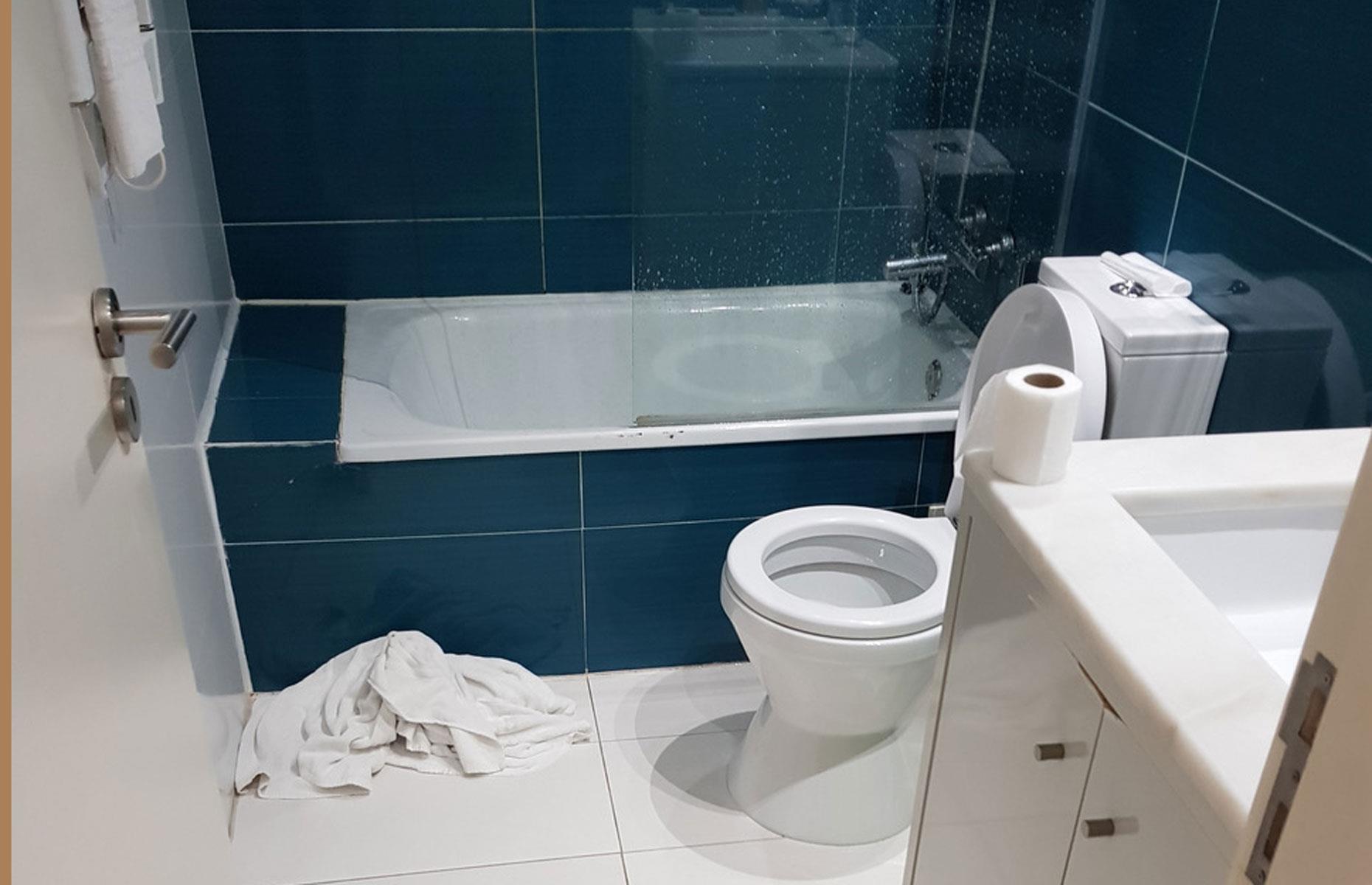 Wet towels on the floor
