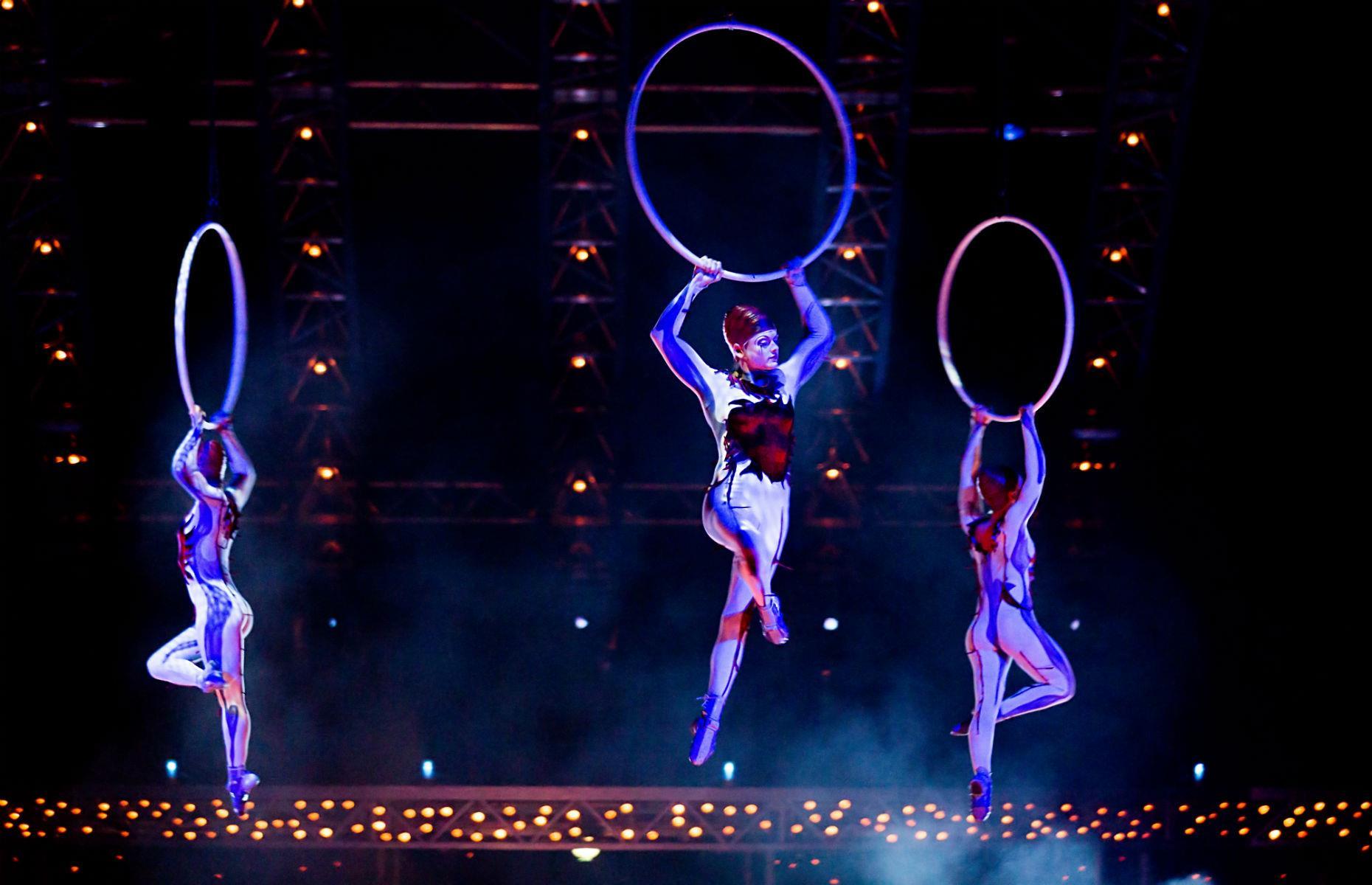 Watch acrobats perform
