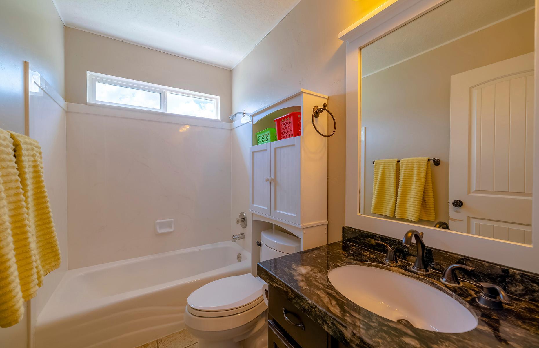 Install over-the-toilet storage