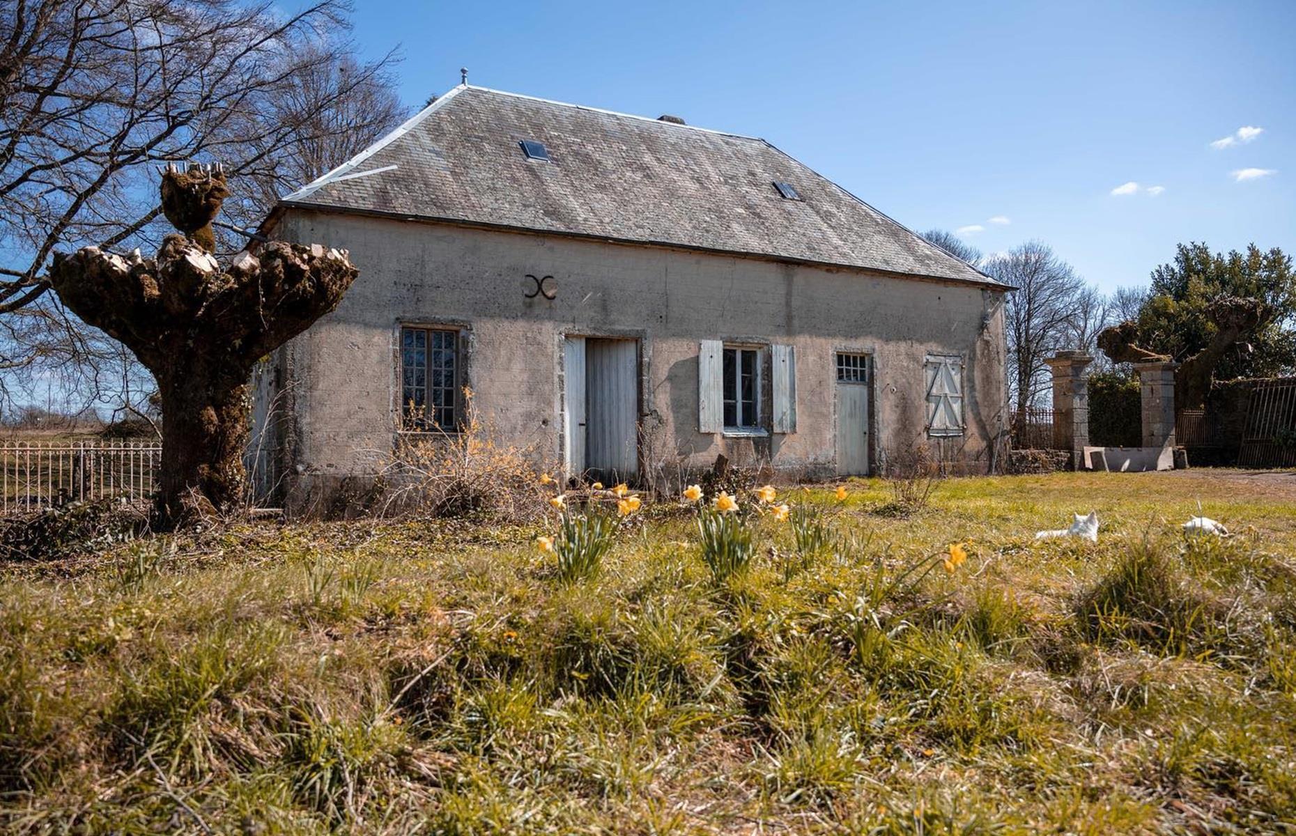 Before: the dilapidated outbuilding