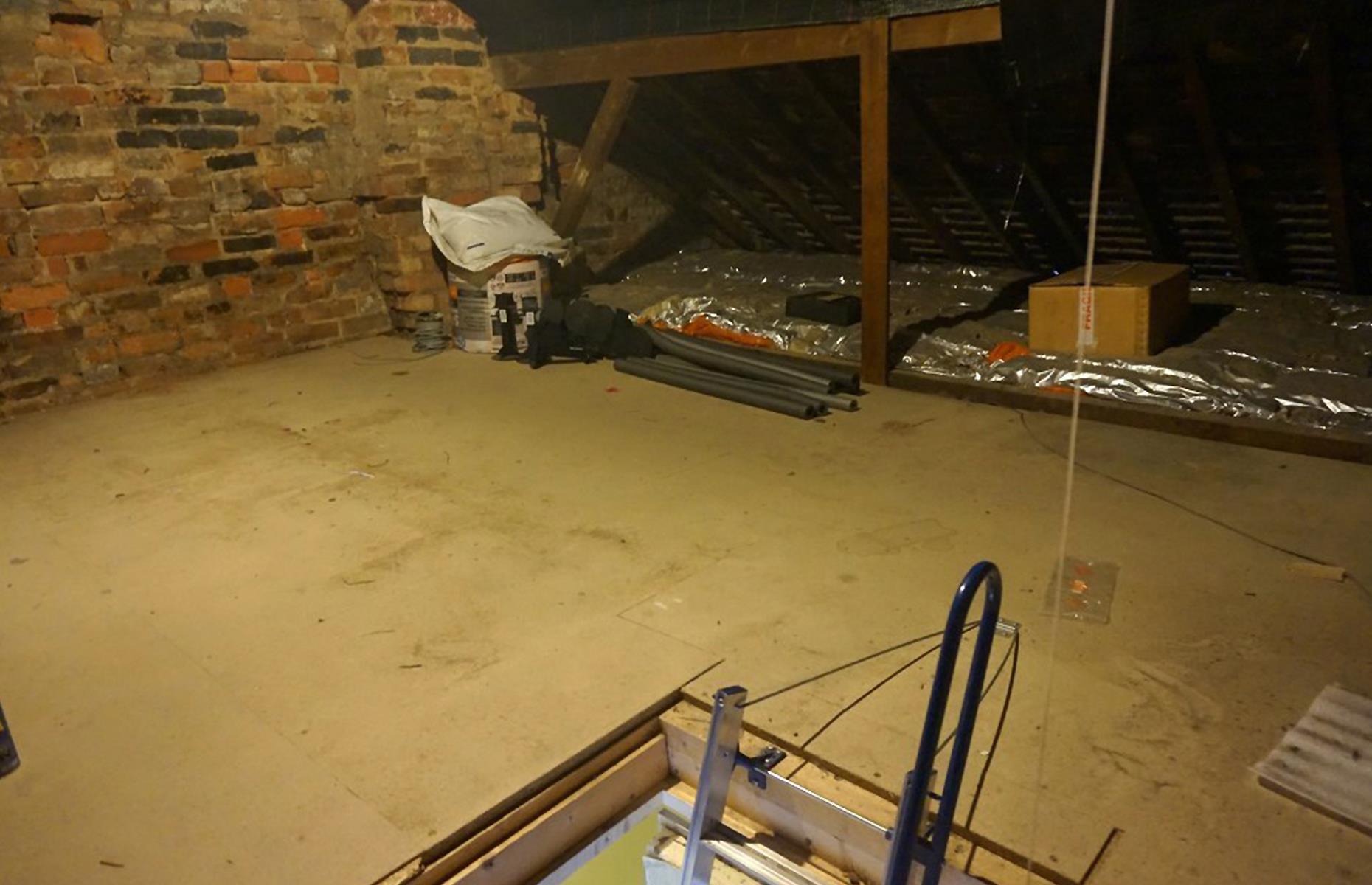 Before: a dusty attic space