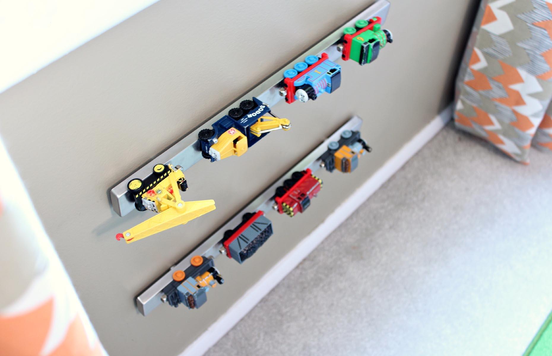 Park toy cars with a magnetic strip