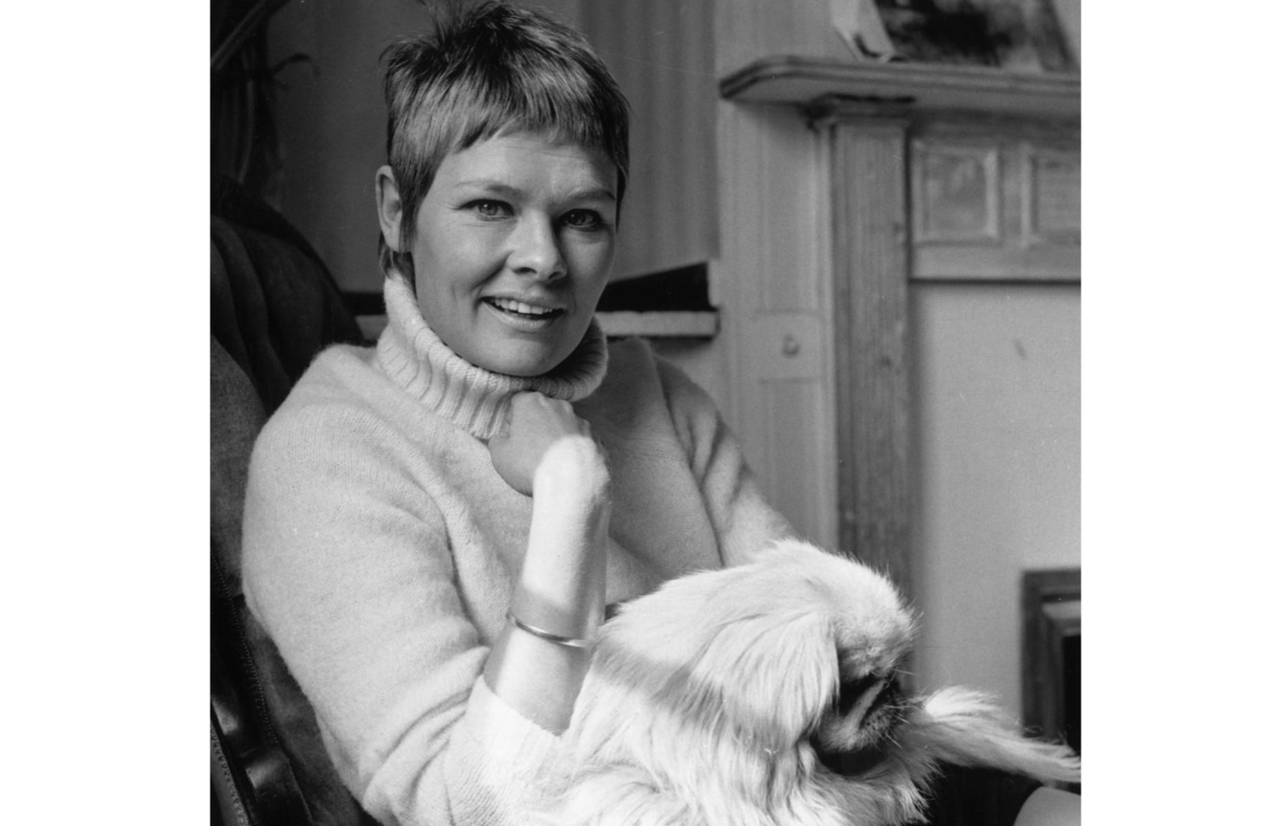 1969: Dame Judi Dench in London with her dog