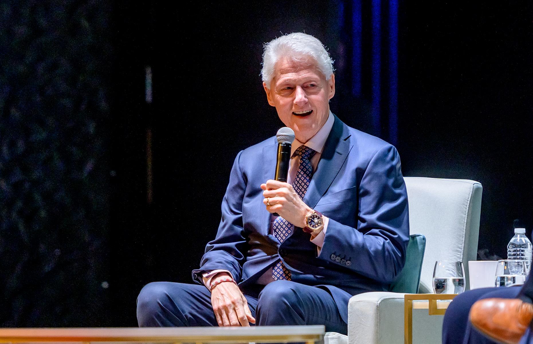 Rubbing shoulders with Bill Clinton