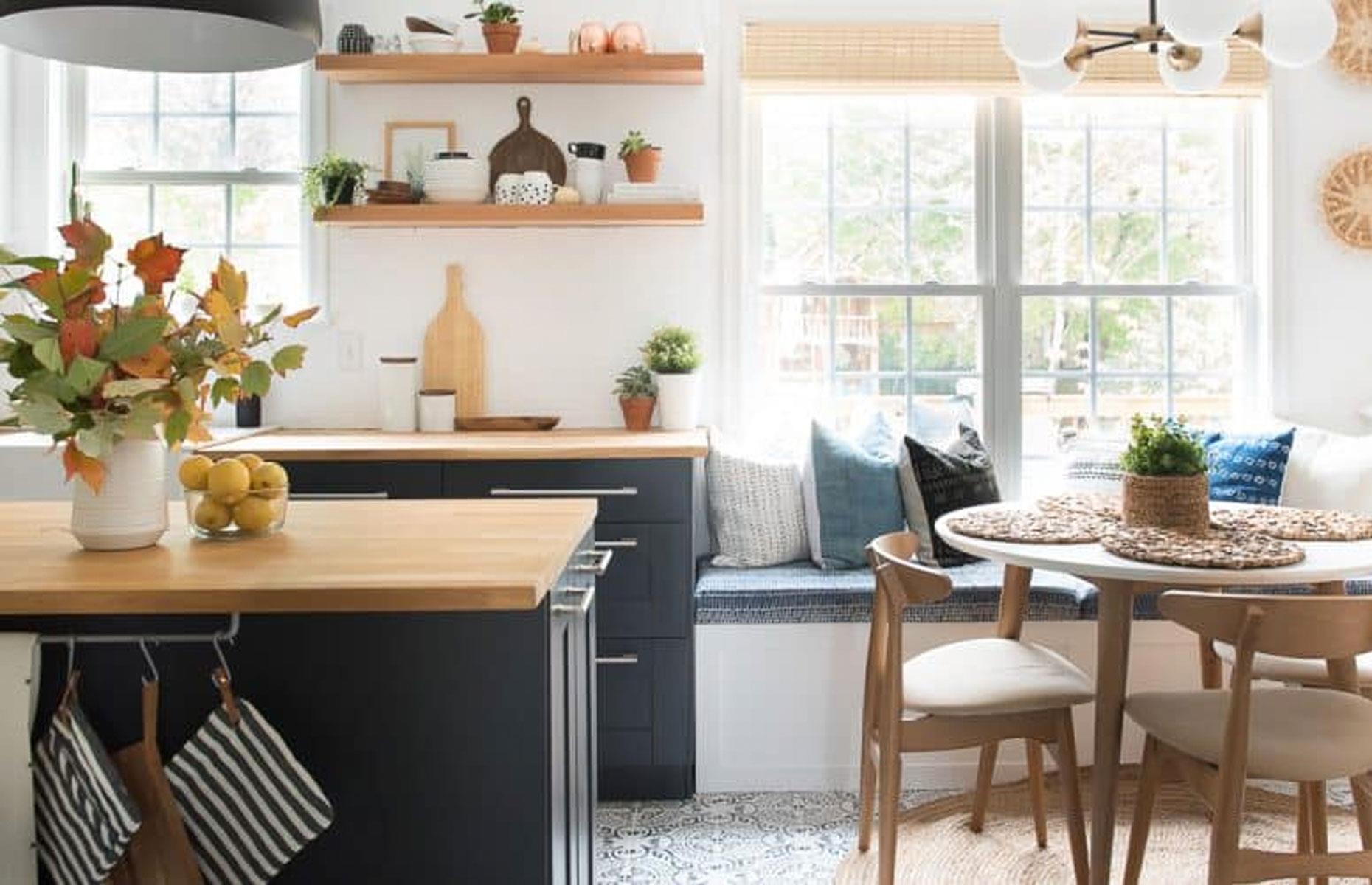 Stylish navy kitchen with statement floor