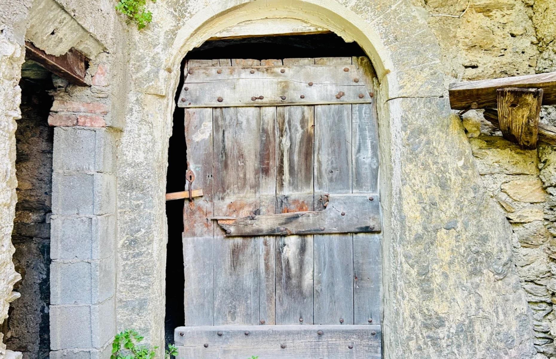 Medieval tower, Piedmont, Italy: crumbling stonework