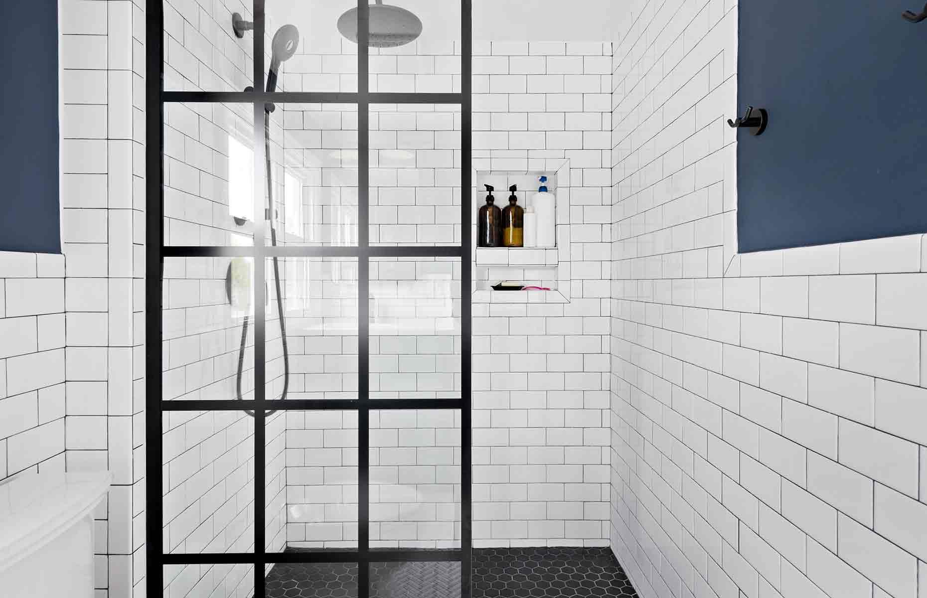 Use a mop to clean bathroom tiles