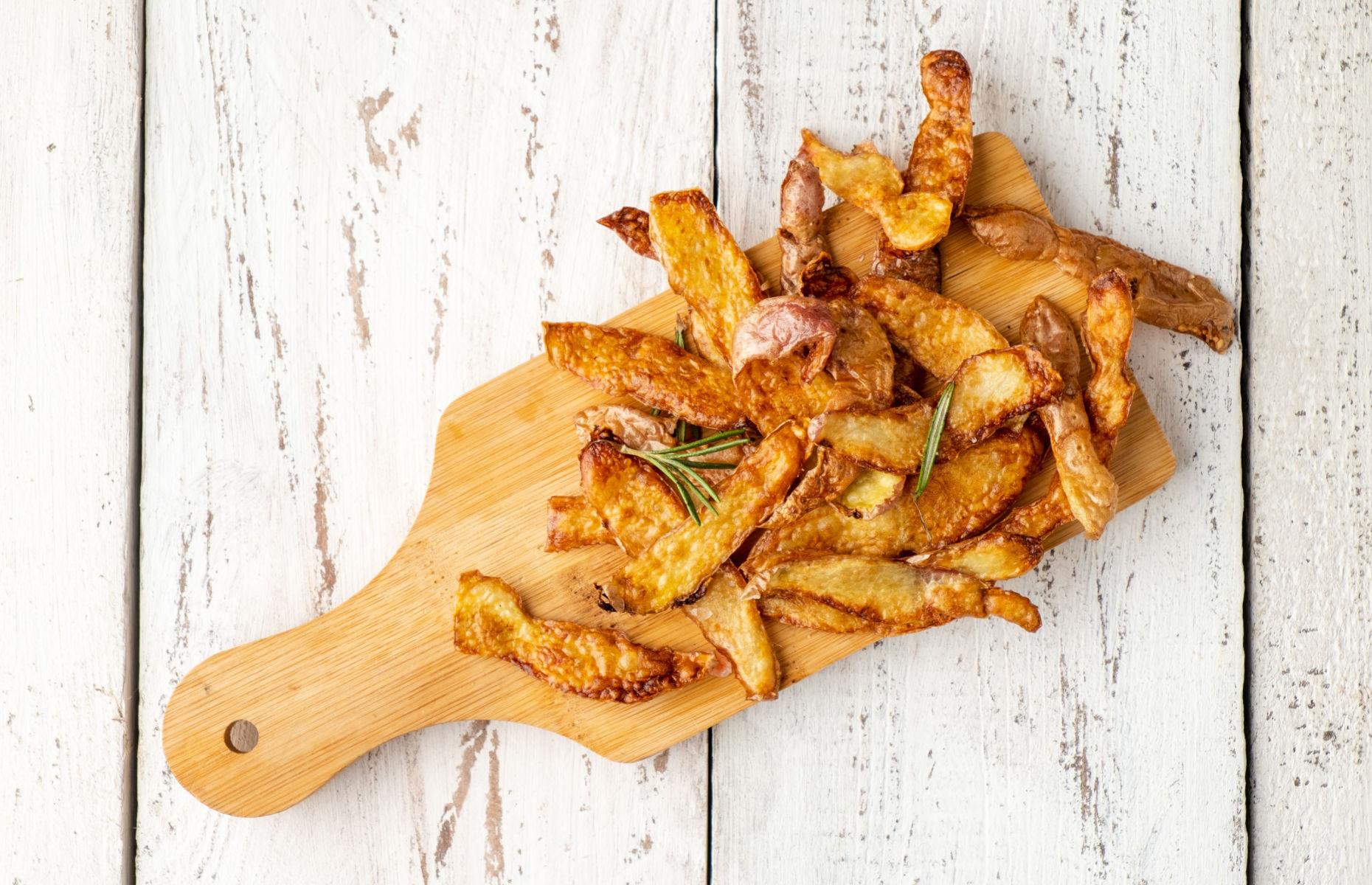 Use roast potato peelings instead of buying crisps