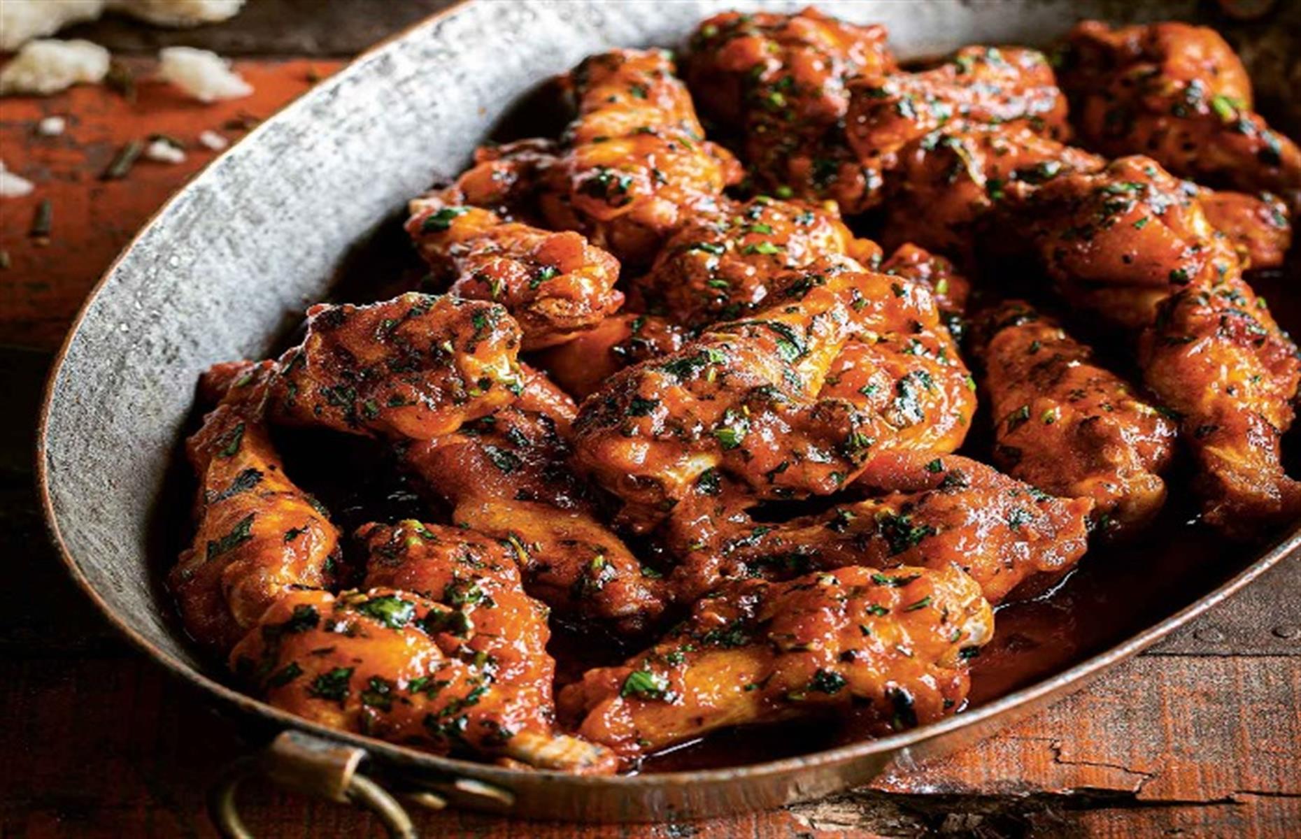 Chicken wings with gochujang, lime and herb butter