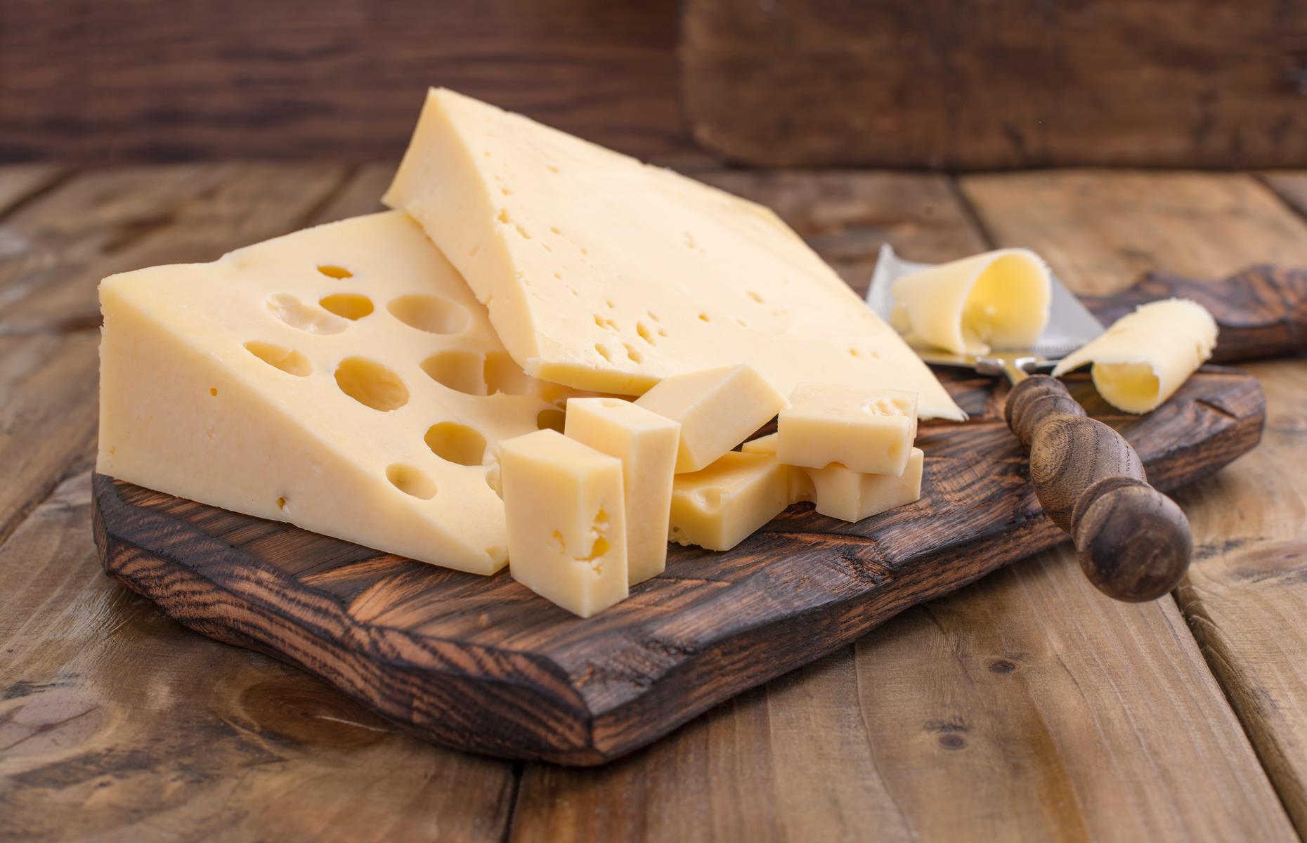 Why does Swiss cheese have holes?
