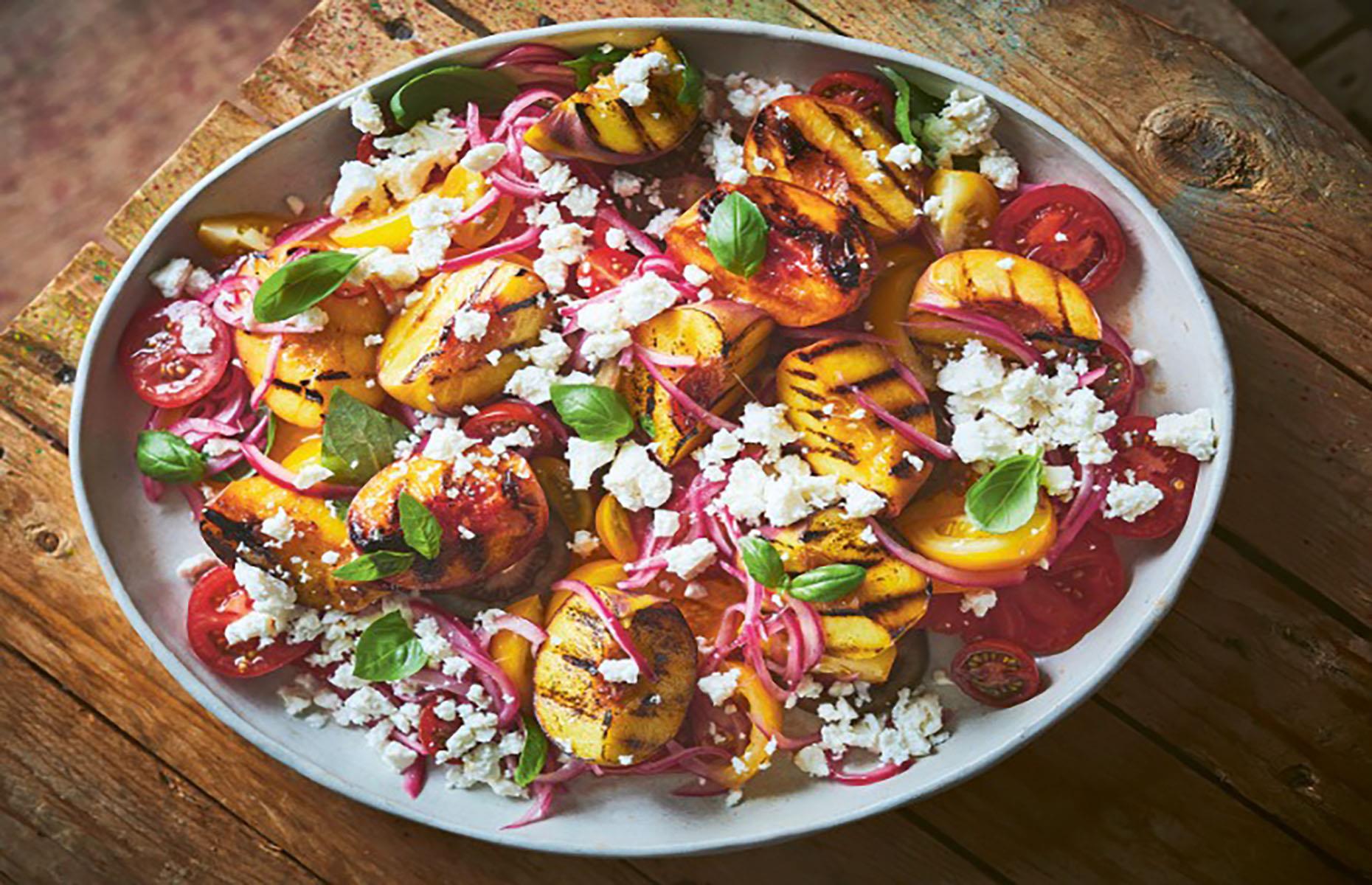 Grilled peaches with tomato, feta and basil