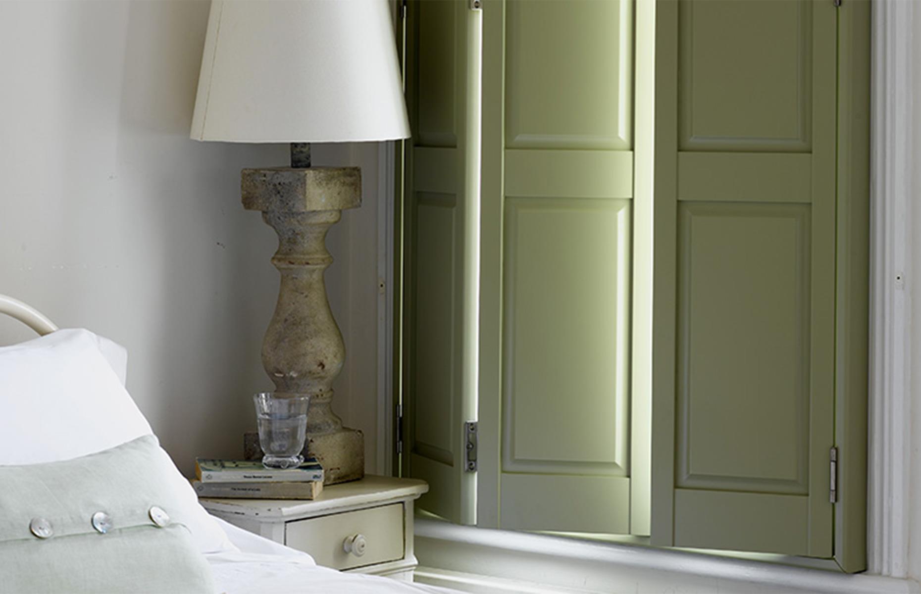 Window Dressing Ideas For Every Style And Budget Loveproperty Com Minimal White Bedroom With Green Painted Victorian Style Solid Wood Panel Shutters
