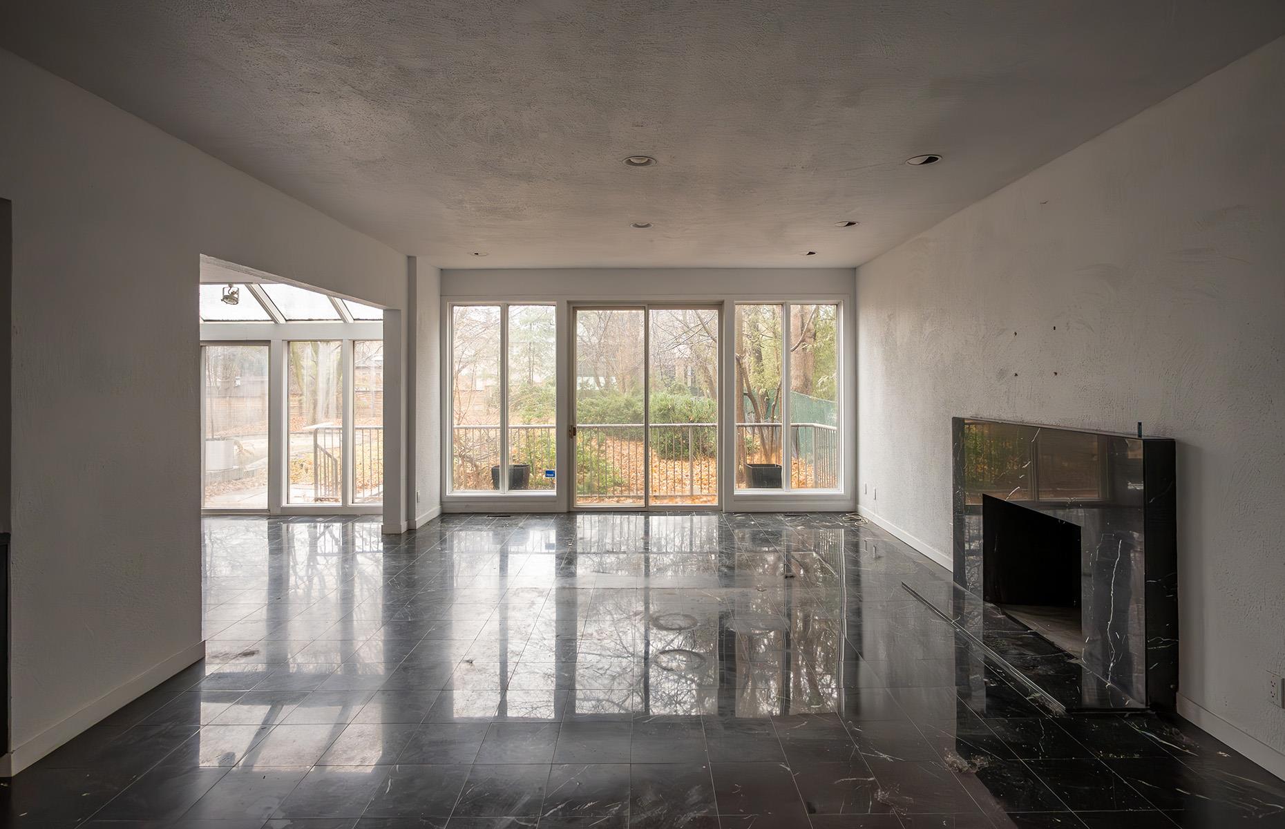 Abandoned million-dollar mansion: floor-to-ceiling glazing
