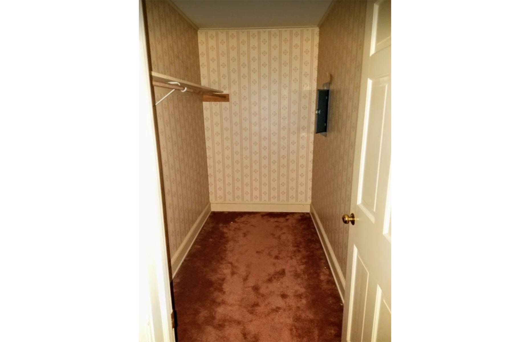 Before: walk-in wardrobe