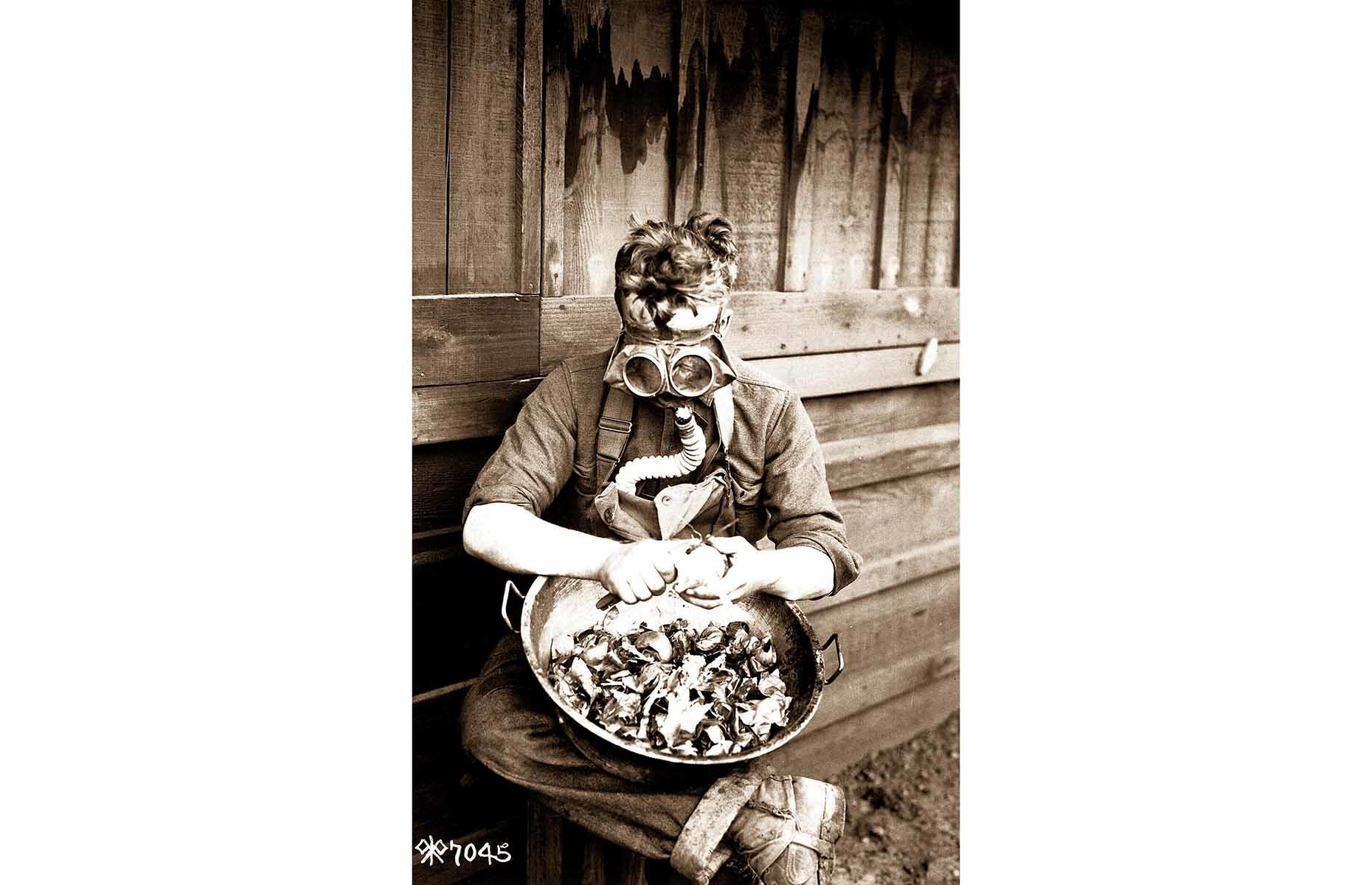 1918: A soldier testing his gas mask in San Diego