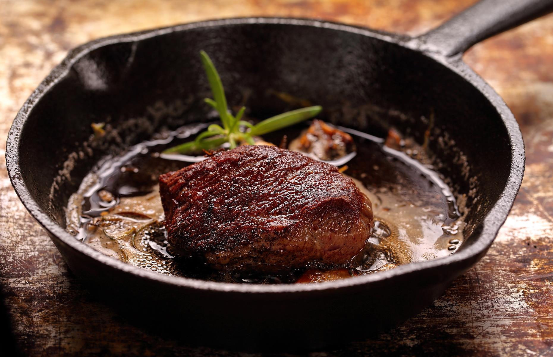 Sear steak on cast iron to help caramelisation