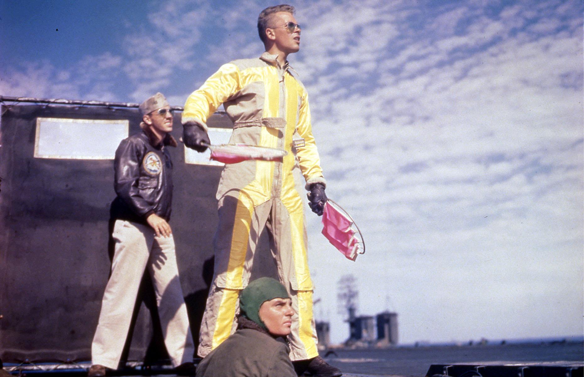April 1945: a Landing Signal Officer at work on the USS Belleau Wood off Okinawa, Japan