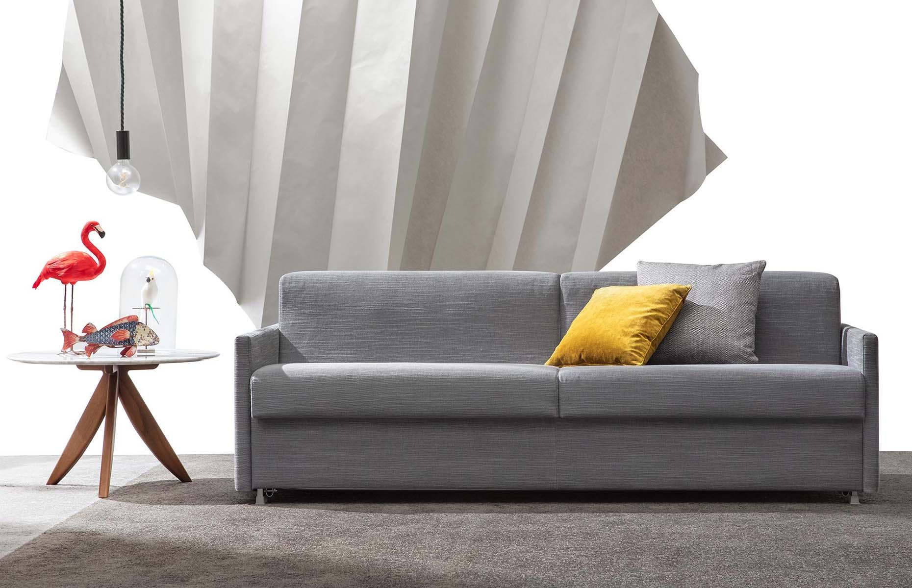 Before: a stylish grey sofa