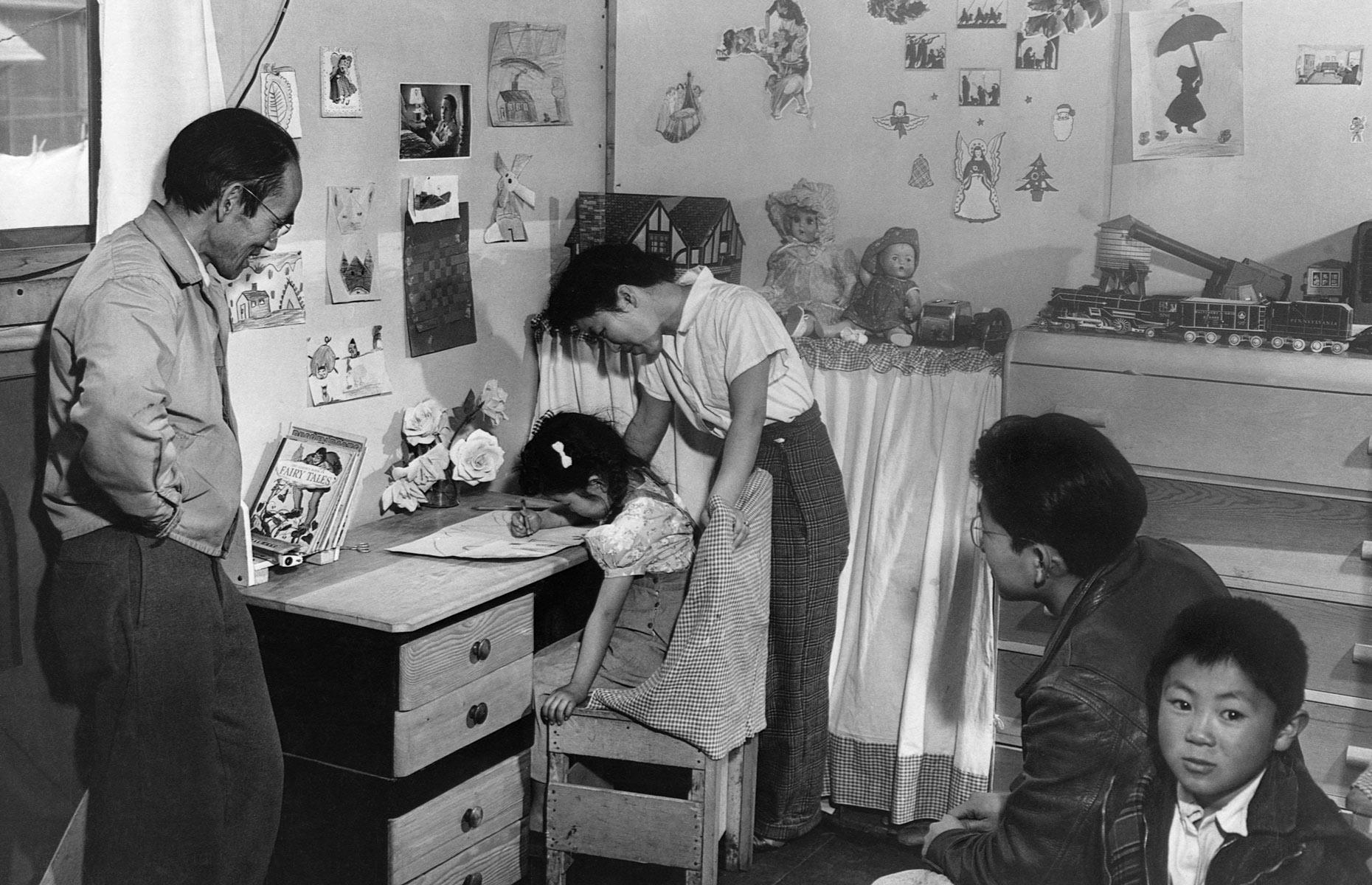 A family at the Manzanar Relocation Center