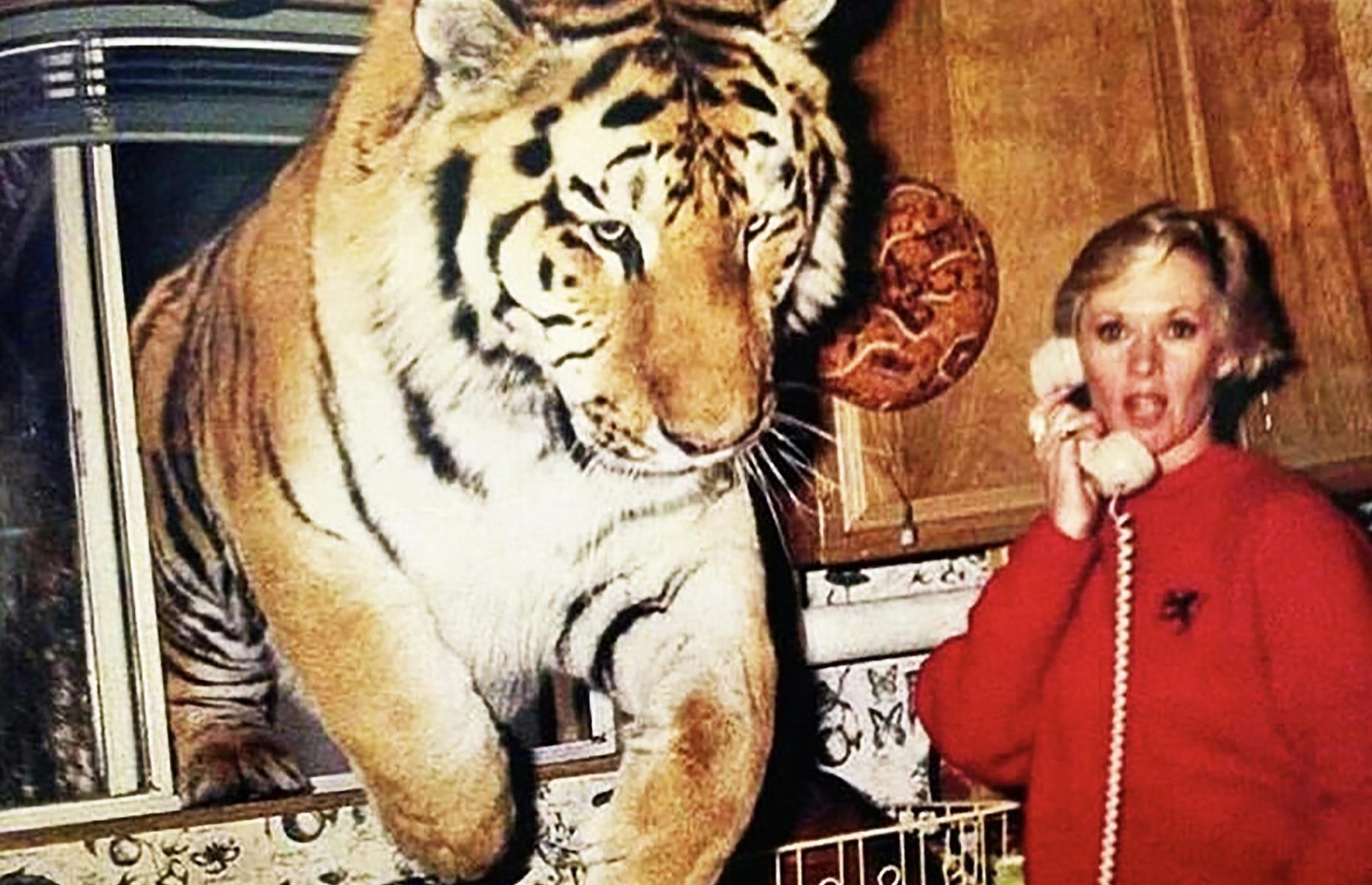 Rare images of famous faces with their furry friends