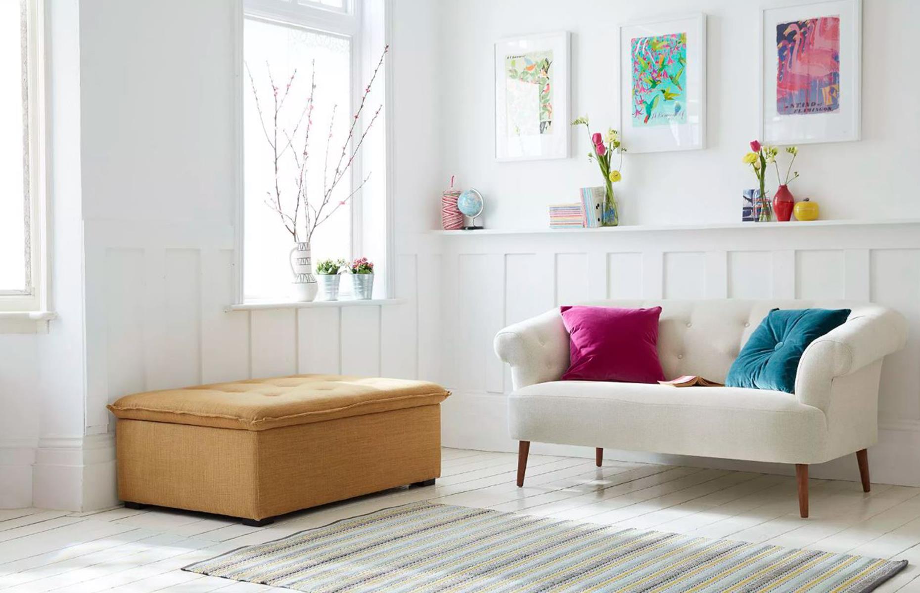 Before: an orange upholstered ottoman