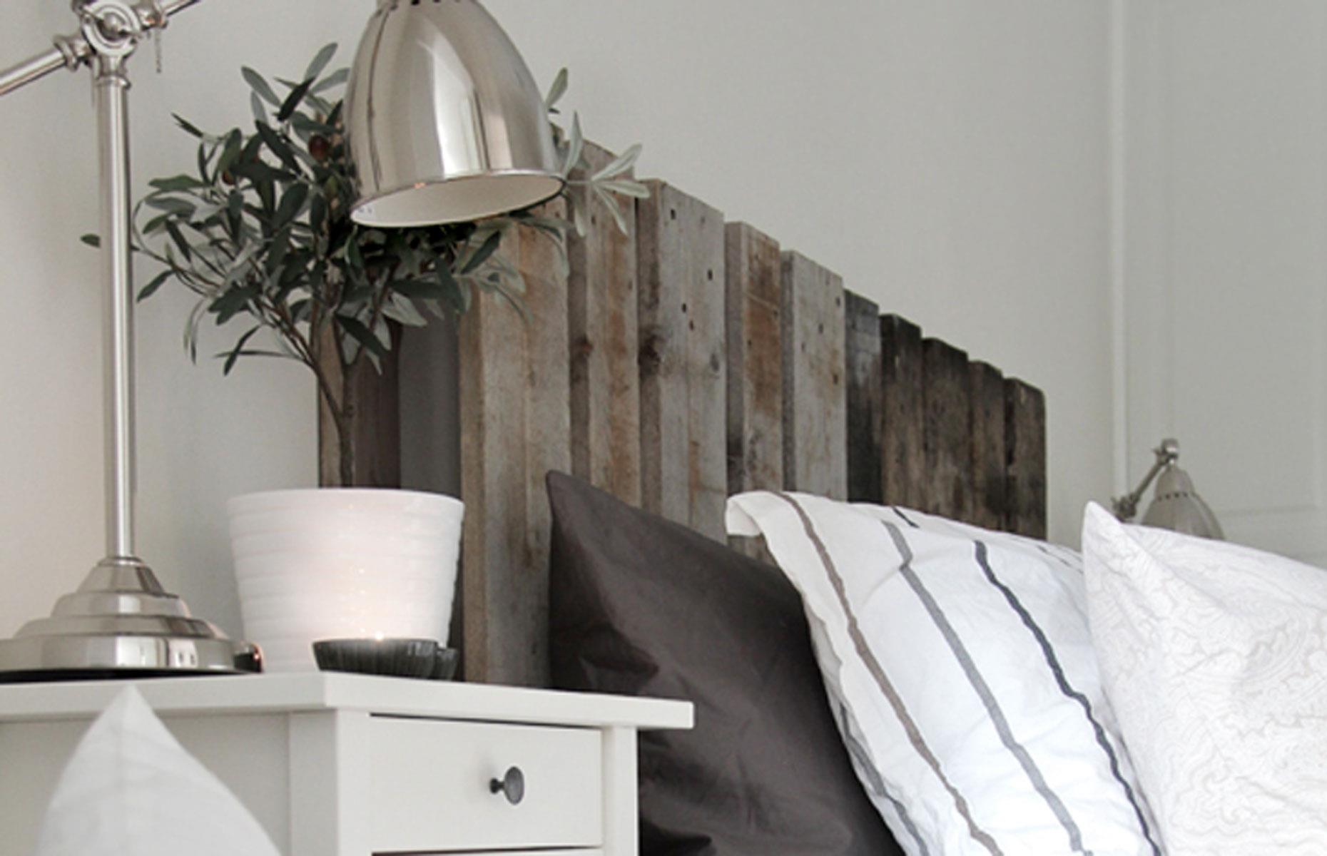 Frame a bed with a pallet headboard