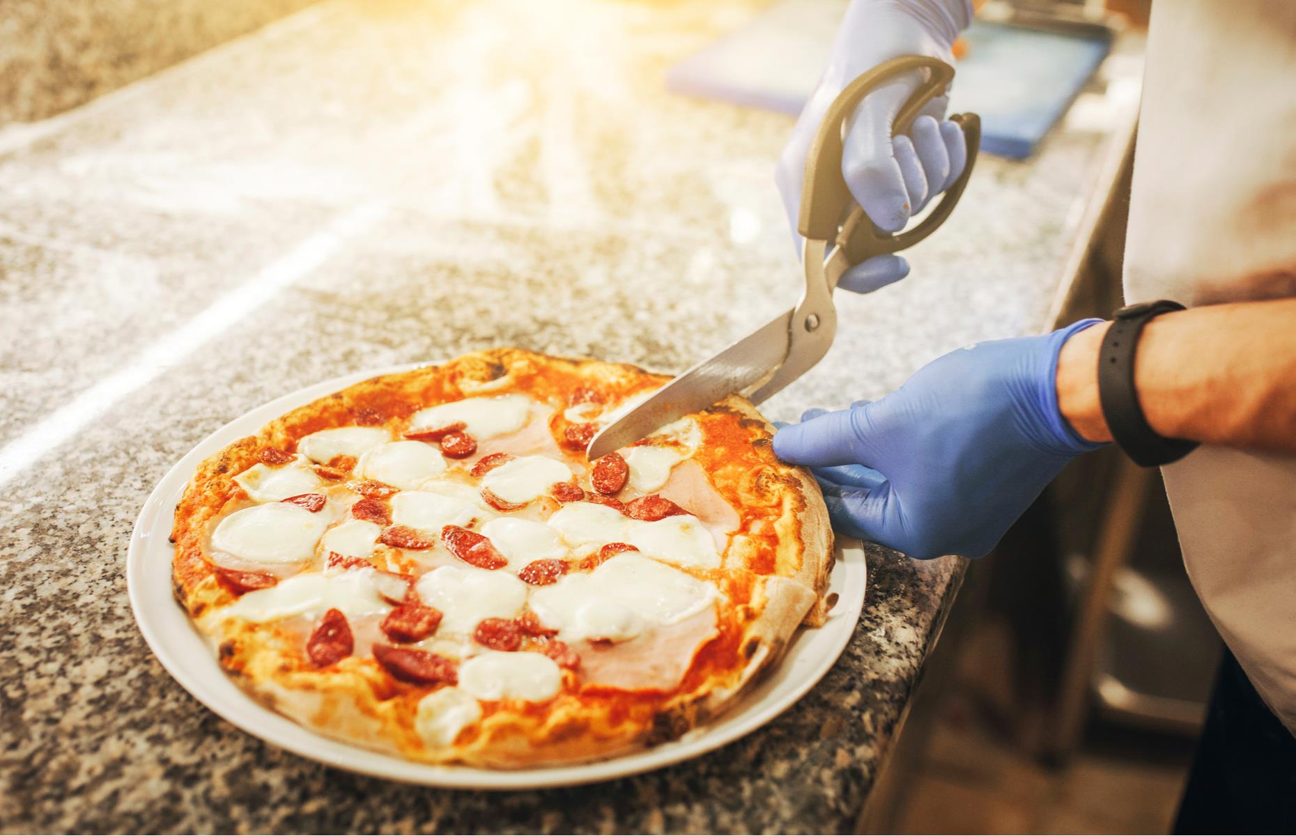 Use pizza scissors for thick crusts