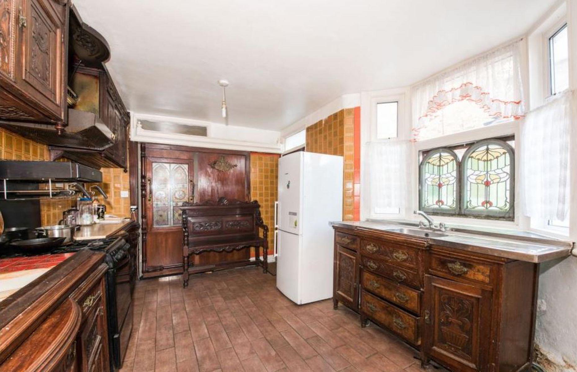 Victorian terrace with tavern, London, UK