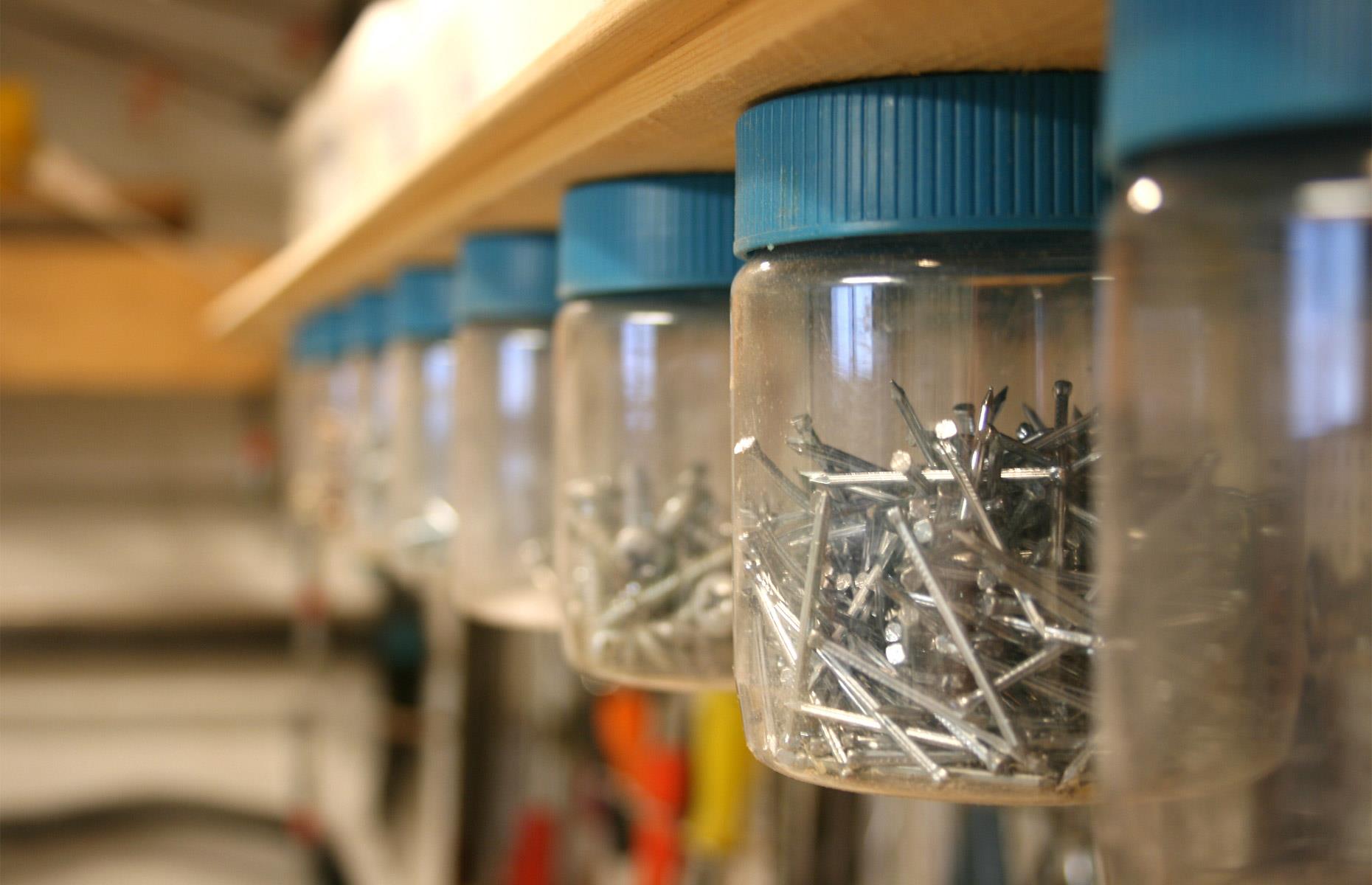 Screw jars underneath a shelf