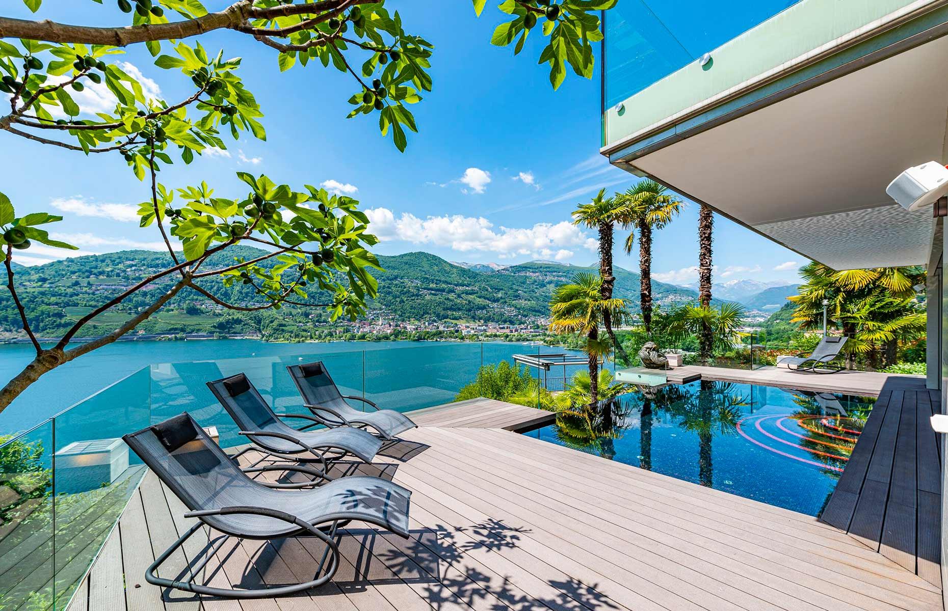An exterior terrace and infinity pool