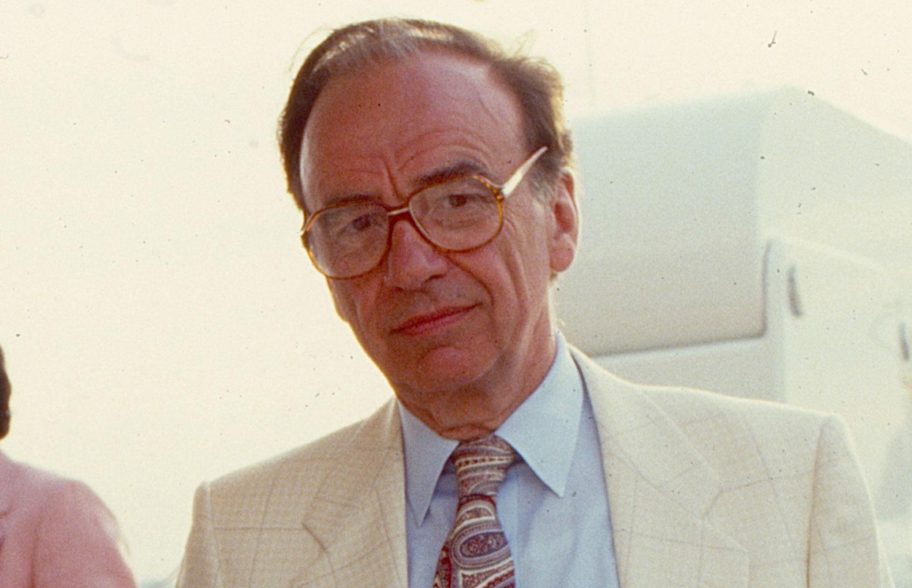 Rupert Murdoch becomes a billionaire 