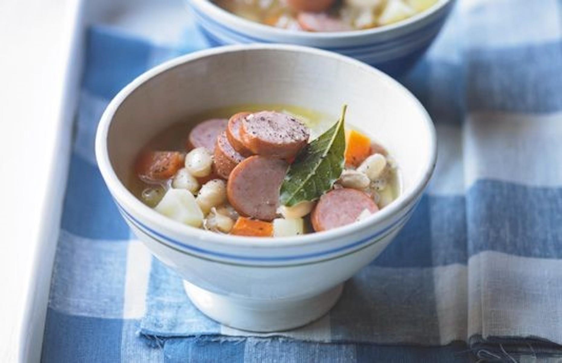 Smoked sausage, bean and root vegetable soup