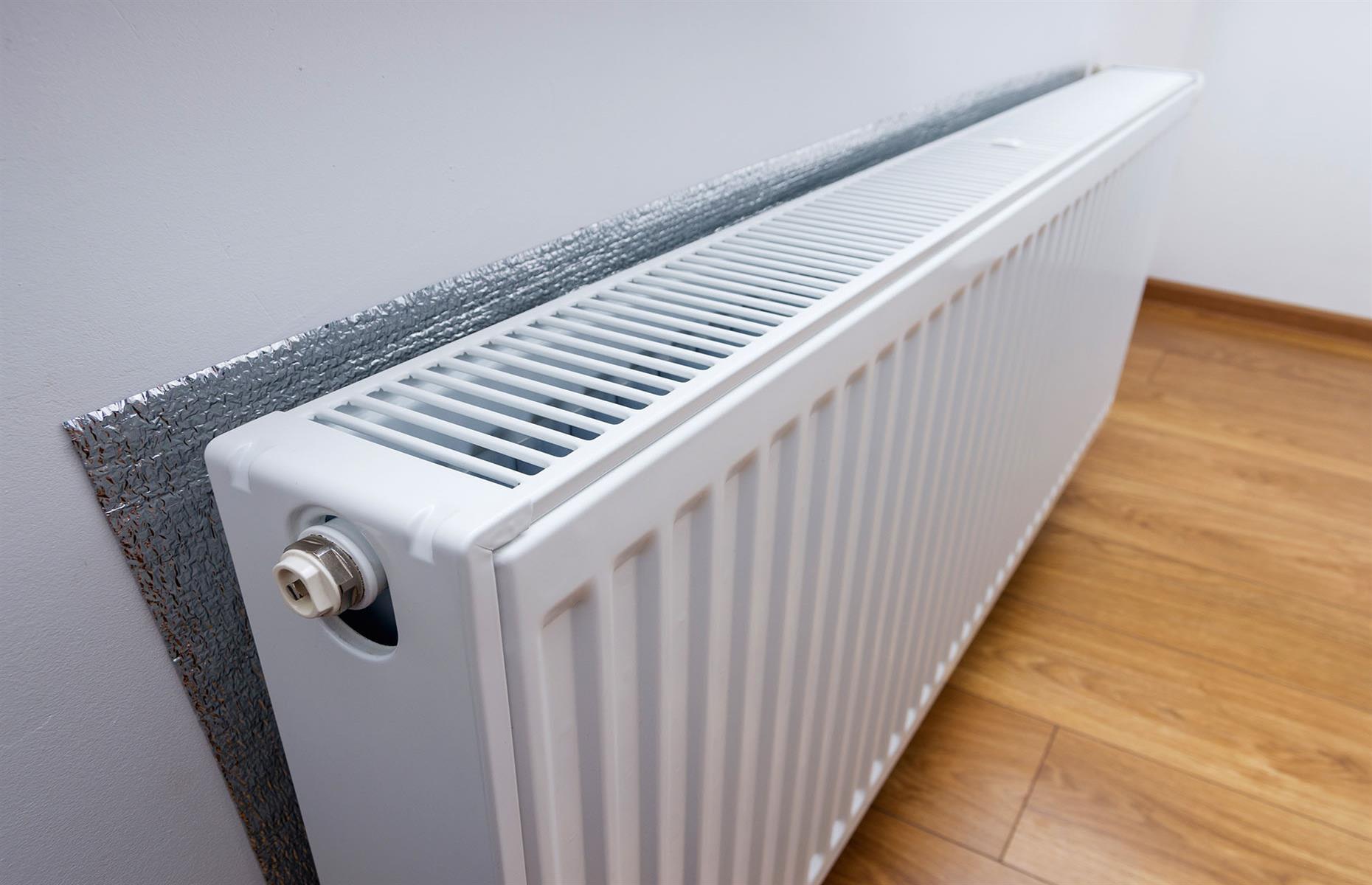 Install radiator reflector panels
