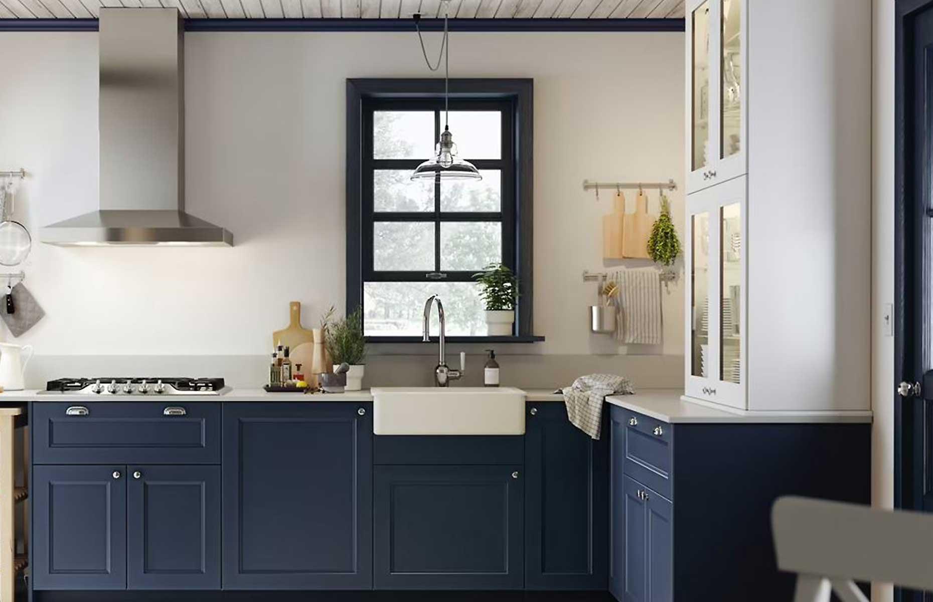 Stylish navy kitchen with back-lit cabinets