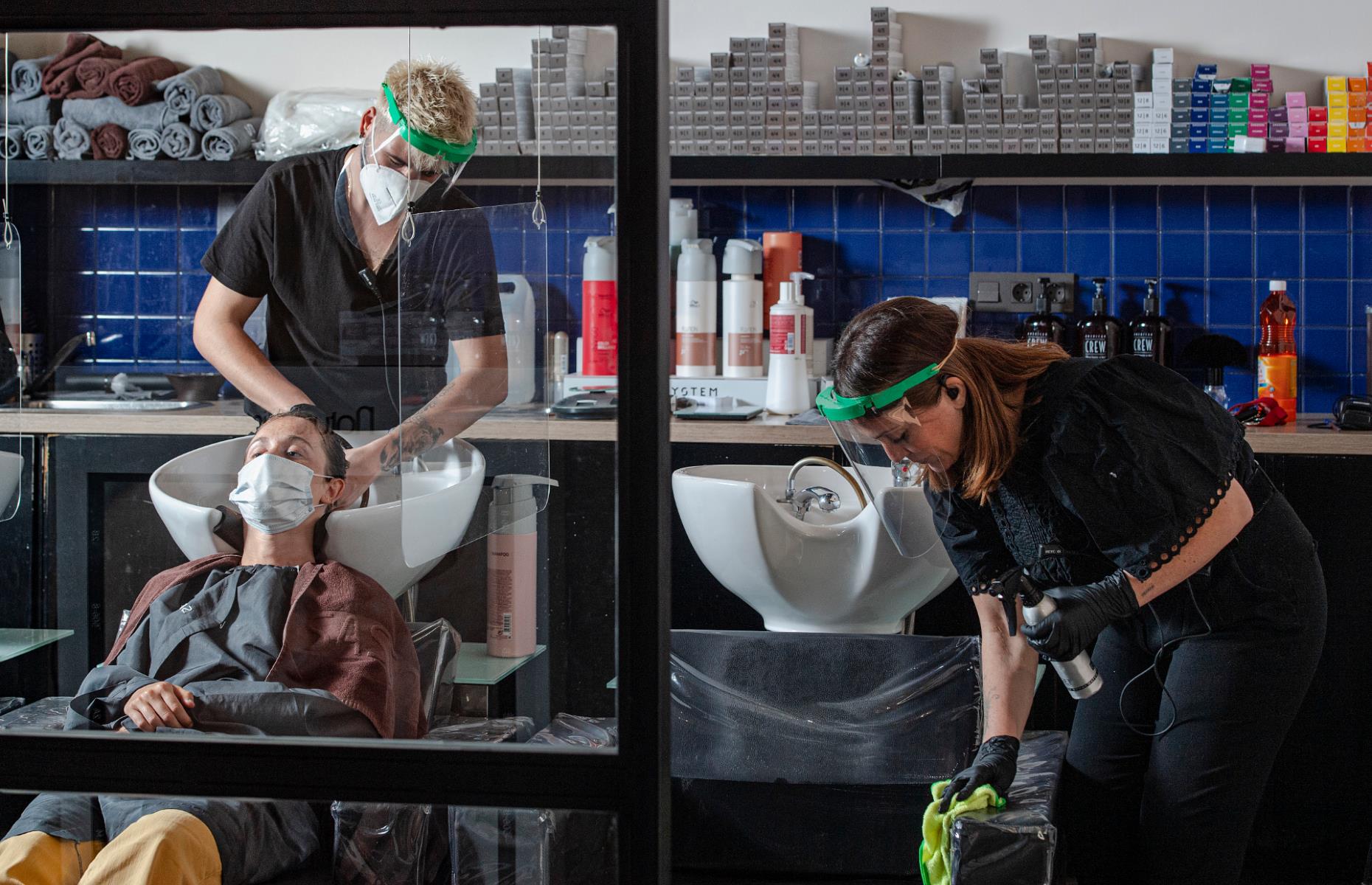 Seville, Spain: Screens and visors at a hair salon
