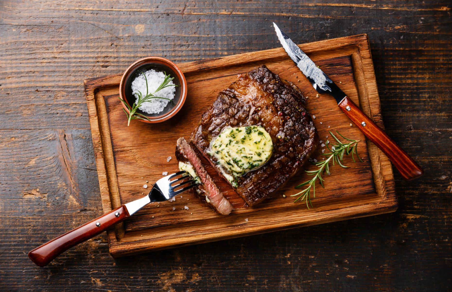 Steak with herb butter and chunky chips