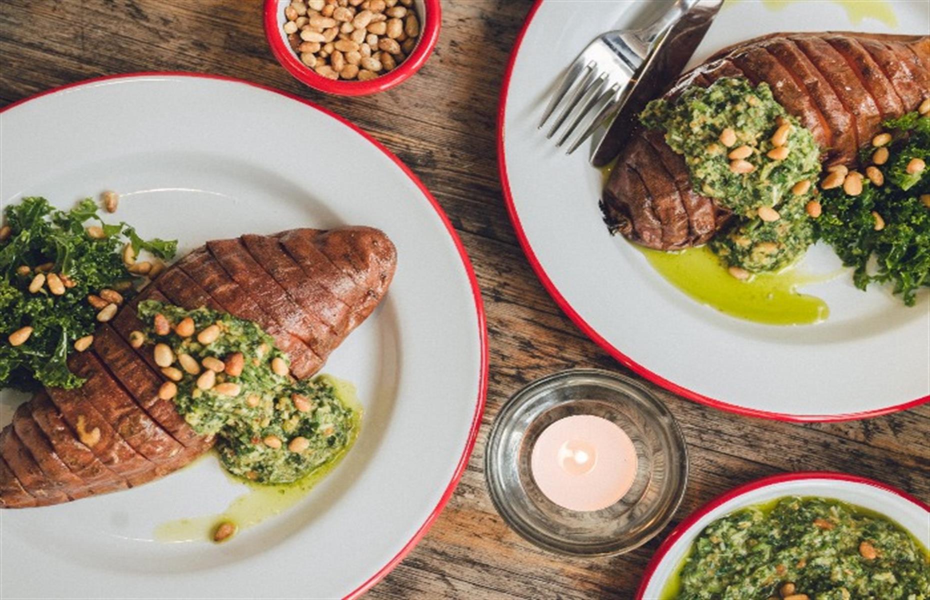 Hasselback sweet potatoes with herb pesto